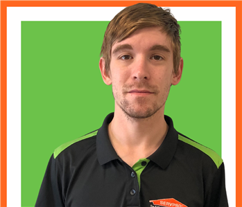 Johnathan, servpro employee against a white background, man